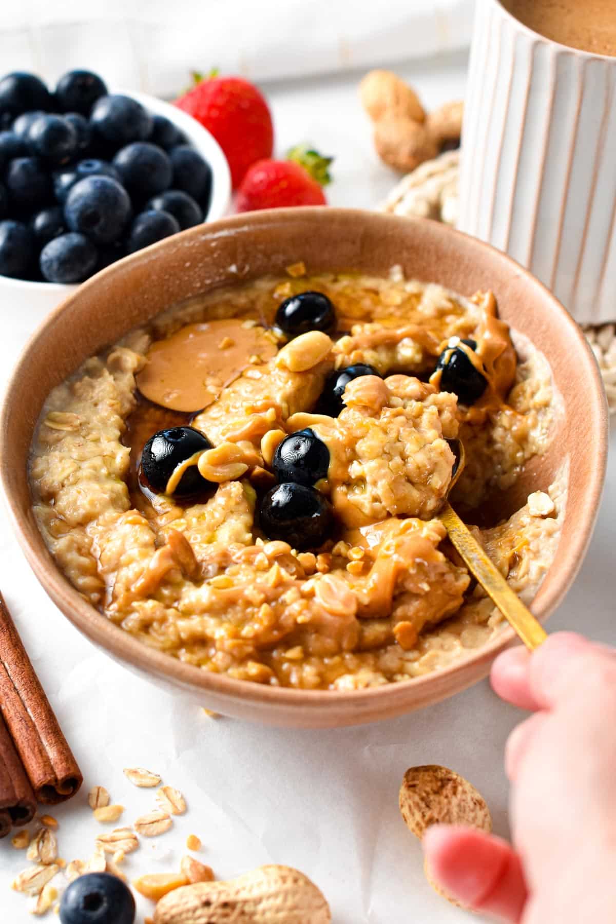 This Peanut Butter Oatmeal bowl is the most creamy, warm healthy breakfast ever packed with proteins, and fiber to keep you full all morning. Plus, this homemade oatmeal recipe is also easy to whip in less than 10 minutes for busy mornings.