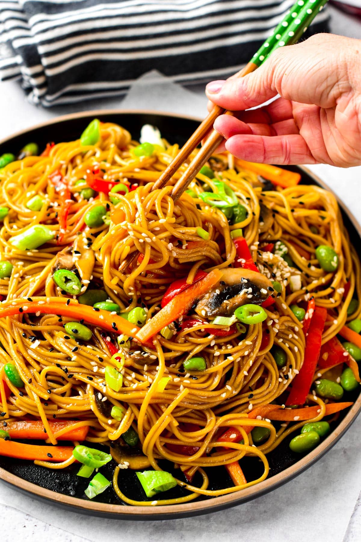 These teriyaki noodles are easy 20 minutes Japanese ramen noodles cooked in a lightly sweet teriyaki sauce with crunchy vegetables. Plus, this noodle recipe is also vegan-approved.