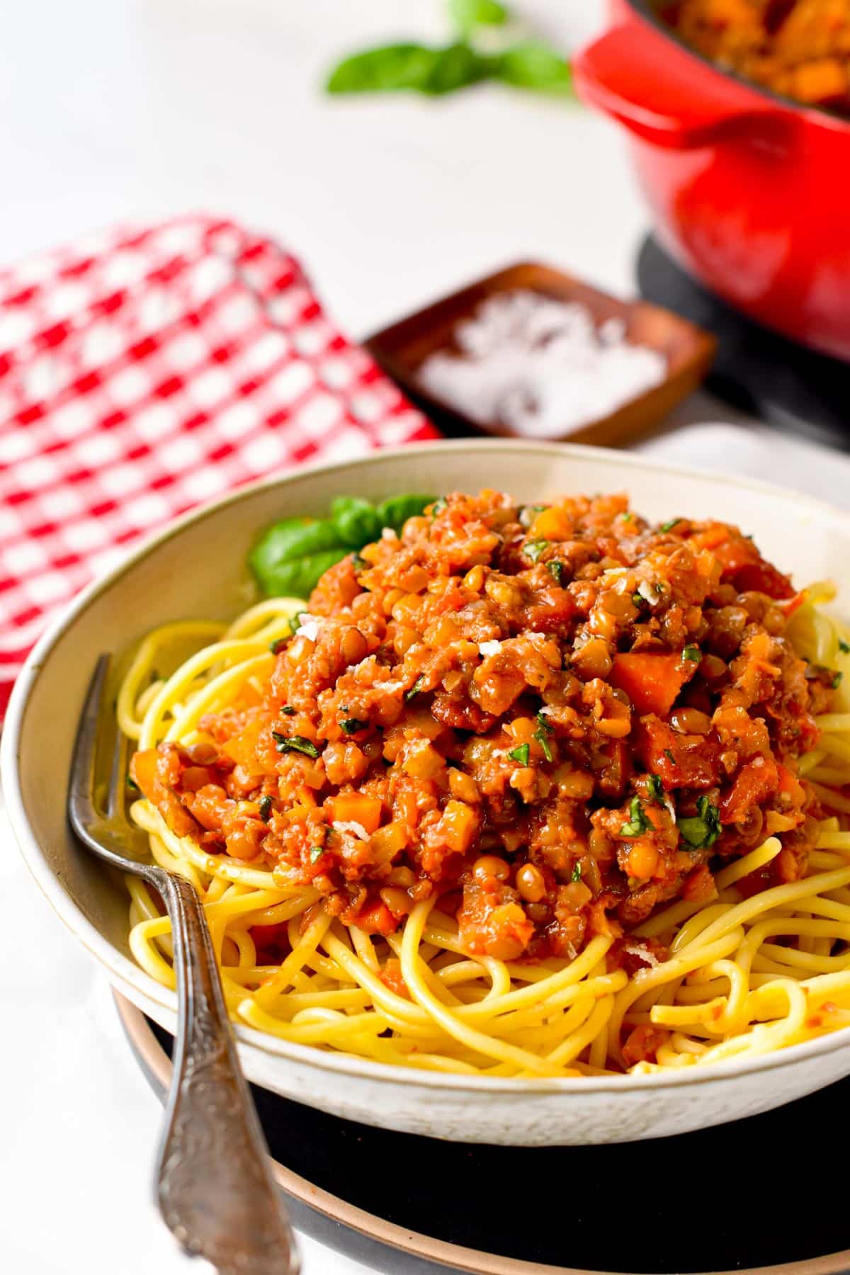 This vegan bolognese recipe is an easy healthy vegan dinner packed with the most delicious Italian flavors and more than 9 plants! If you are looking to add more plants to your plate, this lentil bolognese recipe is a must.