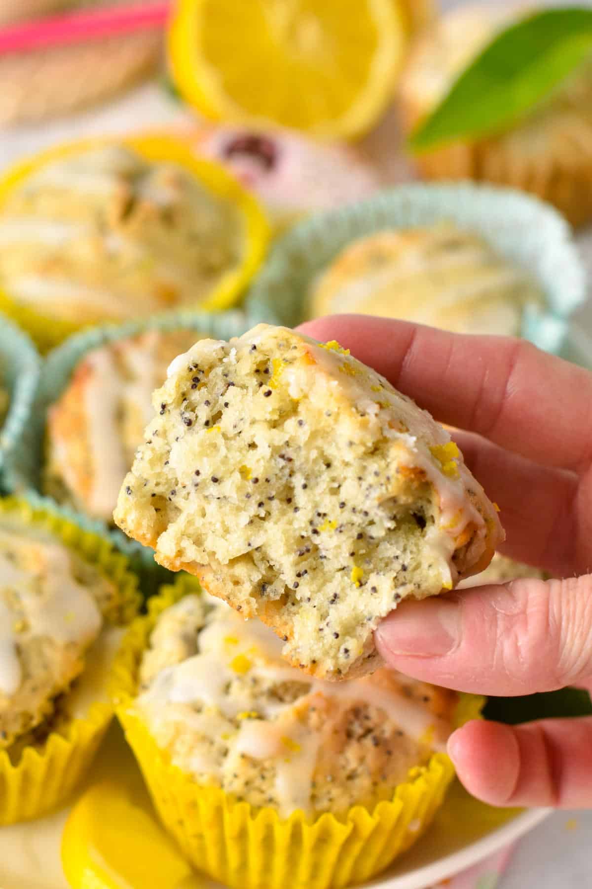 The inside of a vegan Lemon Poppyseed Muffins.