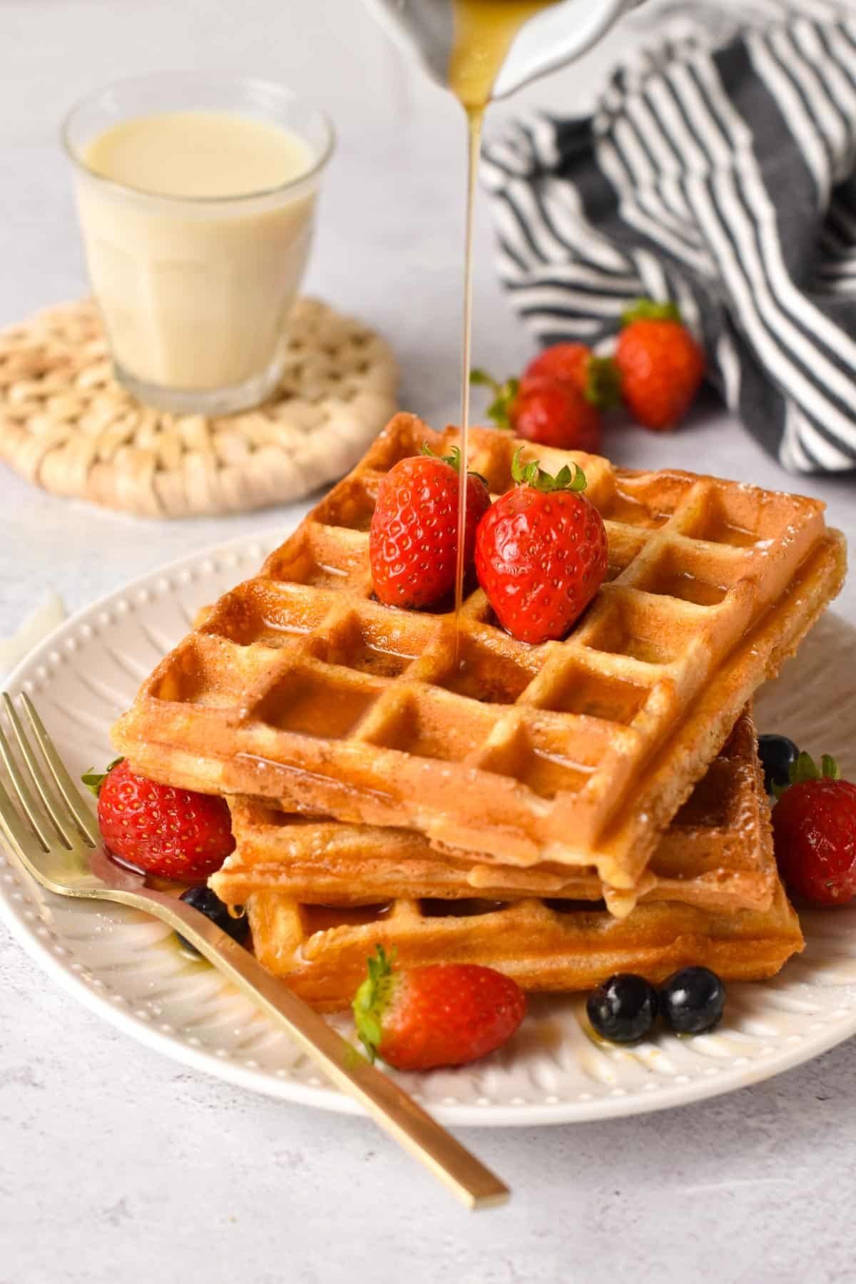 These Vegan Protein Waffles are easy crispy protein waffles packed with 8.5 g of proteins per serving. They are fully plant-based and easy to make in the morning in less than 20 minutes.