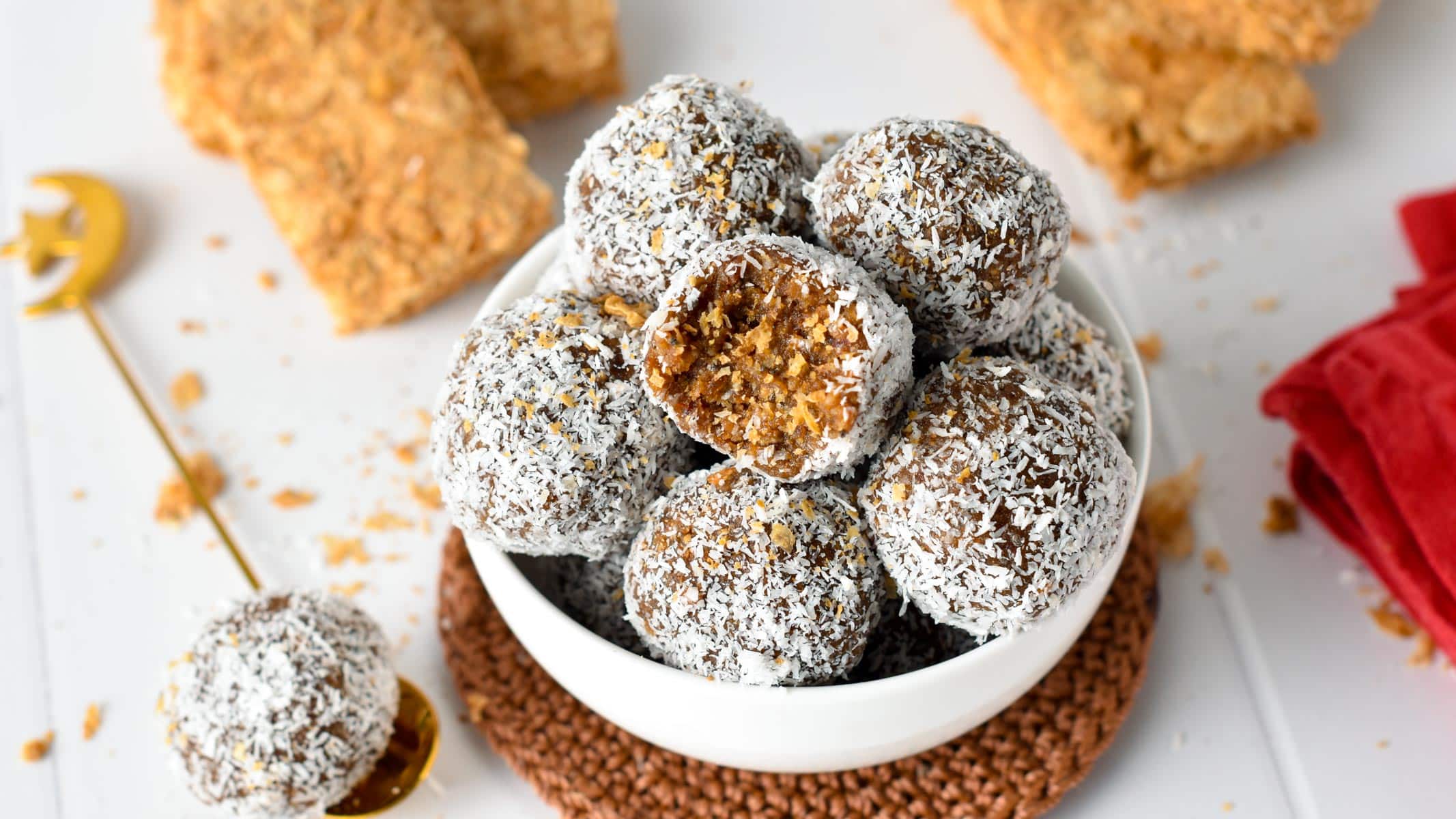 Weetbix Bliss Balls in a bowl, showing the inside of a bliss ball.