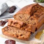 This Date Loaf is the most deliciously moist, sweet bread filled with sweet pieces of juicy dates. Plus, this date loaf recipe is also egg-free, dairy-free, and made healthier using wholesome ingredients.