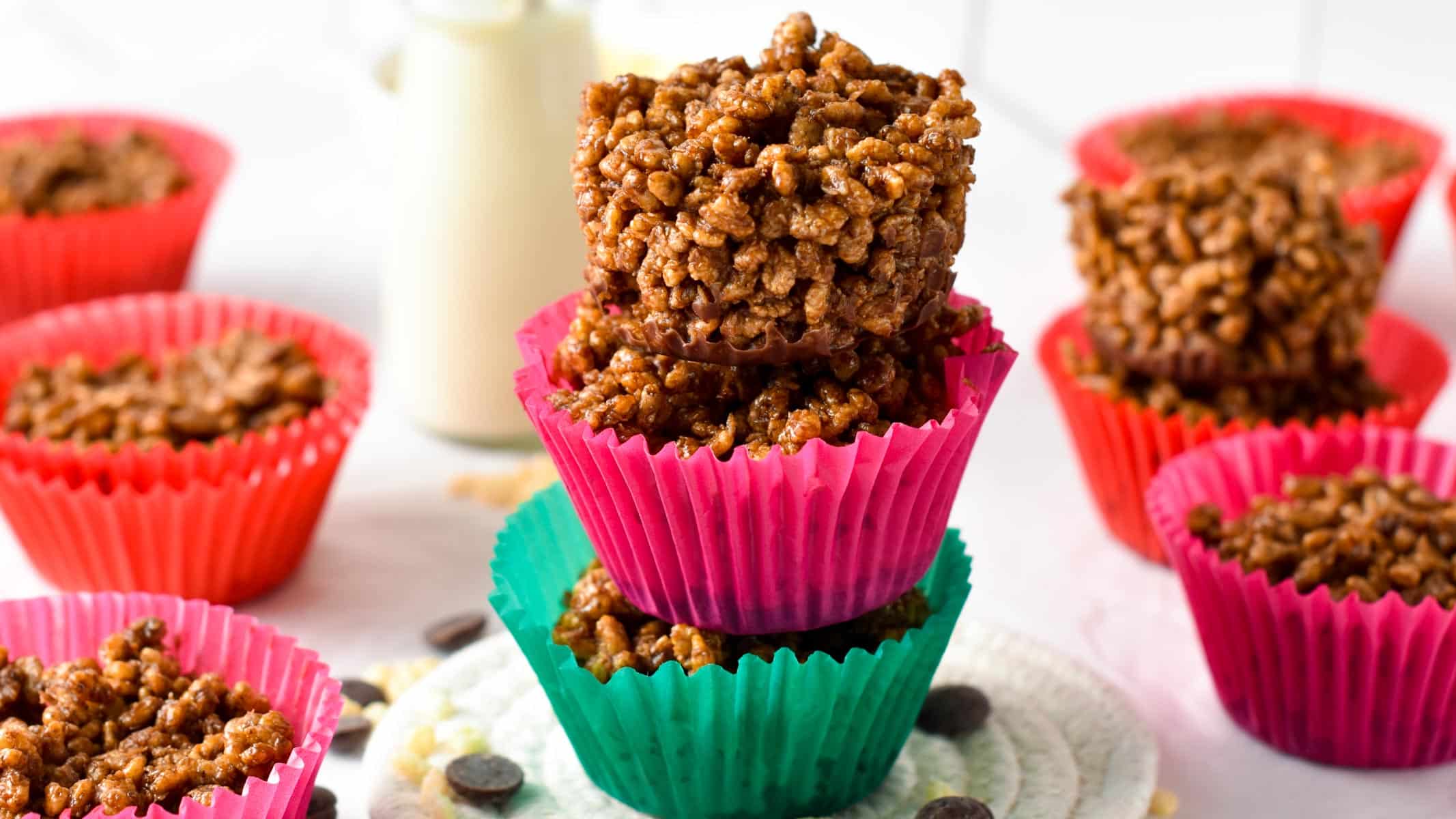 Healthy chocolate crackles stacked in muffin cups.