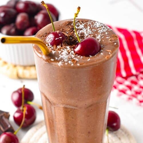 This Chocolate Cherry Smoothie is a thick and creamy chocolate smoothie packed with cherries. It has the most delicious chocolate cherry flavors, like a black forest dessert but in healthy drinks packed with spinach and chia seeds to energize you.