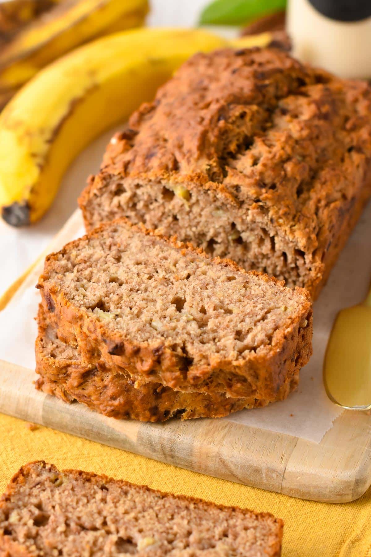 No Sugar Added Banana Bread  on a chopping board showing its crumb.