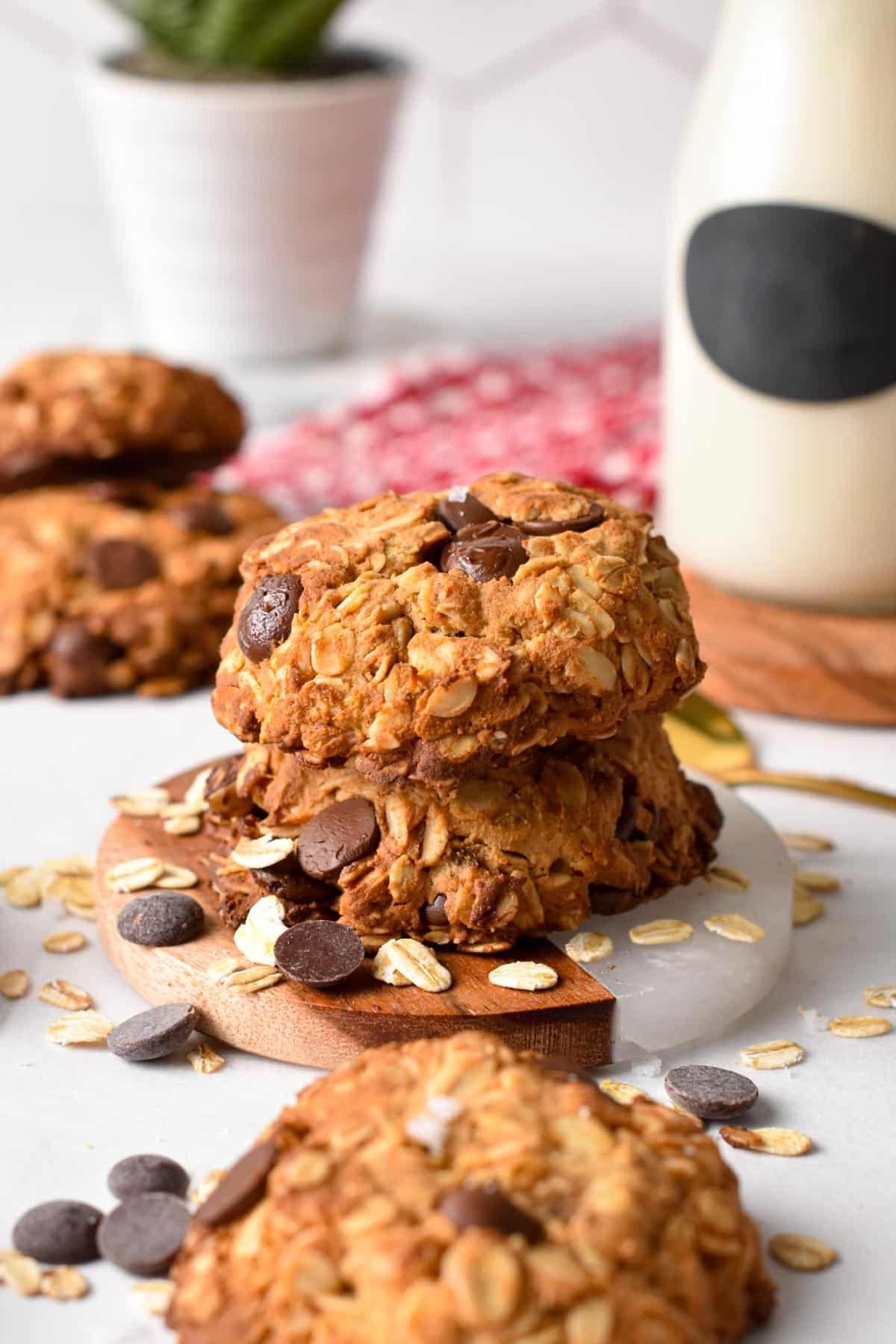 Protein Oatmeal Cookies stacked on a coaster.