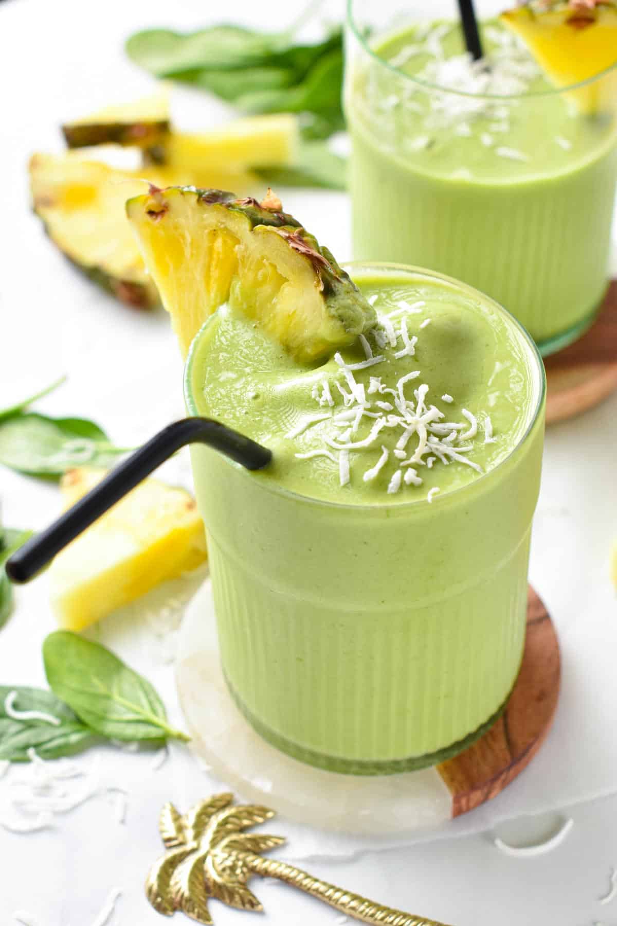 This Spinach Pineapple Banana Smoothie is a delicious easy green smoothie packed with tropical flavors and nutrients from spinach.