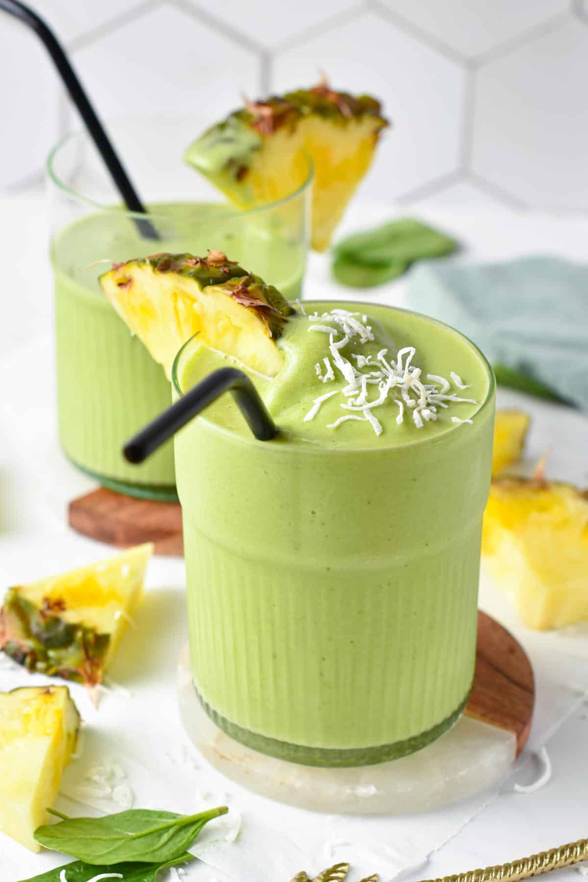 This Spinach Pineapple Banana Smoothie is a delicious easy green smoothie packed with tropical flavors and nutrients from spinach.This Spinach Pineapple Banana Smoothie is a delicious easy green smoothie packed with tropical flavors and nutrients from spinach.