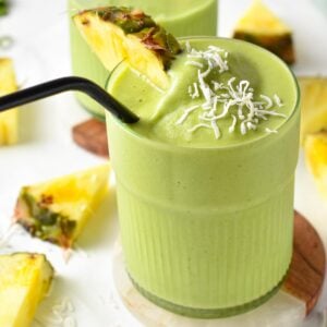 This Spinach Pineapple Banana Smoothie is a delicious easy green smoothie packed with tropical flavors and nutrients from spinach.