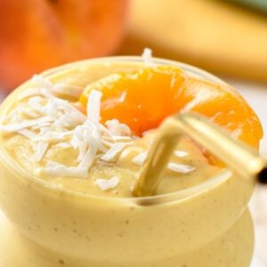 This Banana Peach Smoothie is a deliciously thick and creamy smoothie for summer packed with peach flavors.