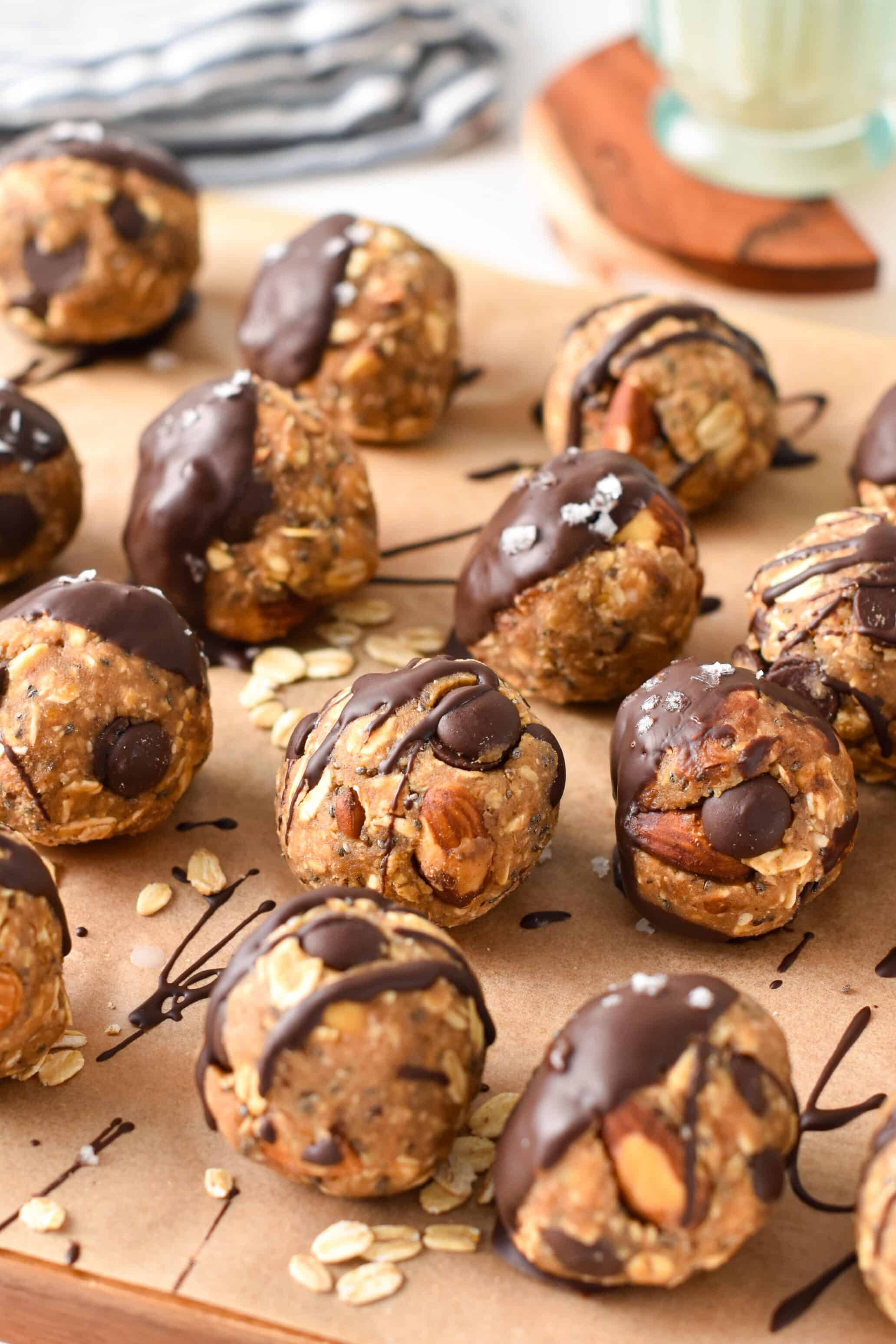 Banana Protein Balls decorated with melted chocolate.