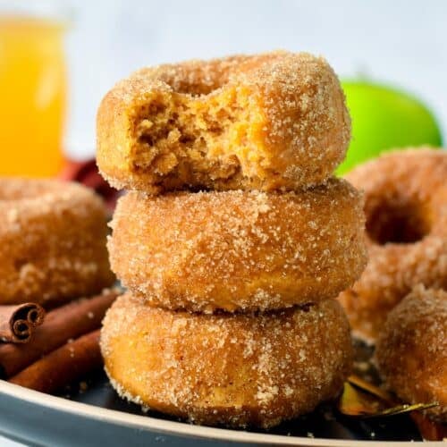a stack of vegan apple cider vinegar donuts