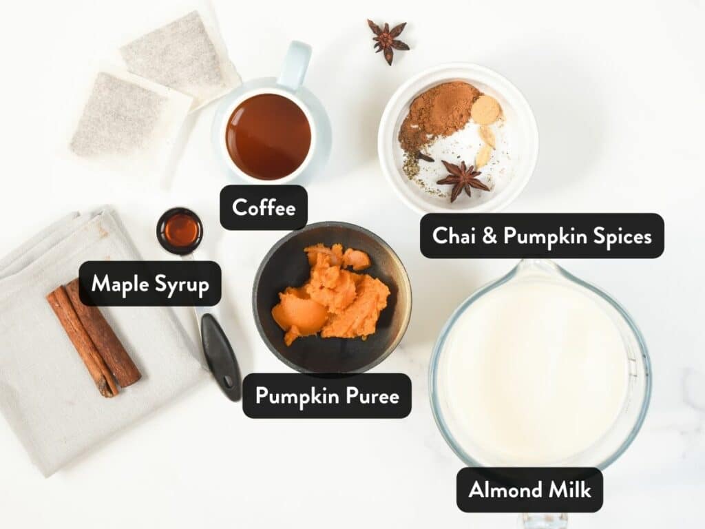 Pumpkin Spice Chai Latte ingredients in small ramekins with labels.