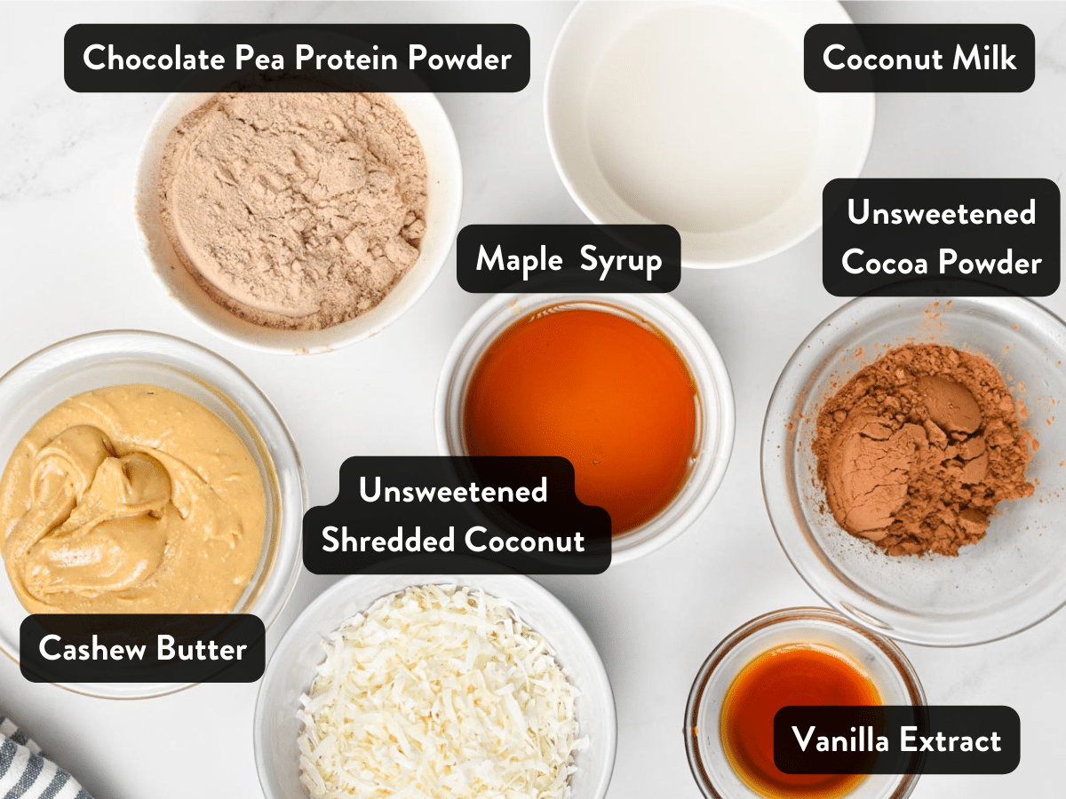 Ingredients for Coconut Chocolate Protein Balls in various serving bowls.