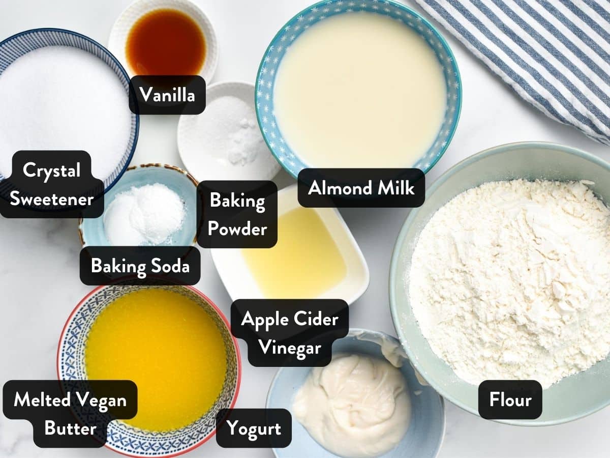 Ingredients for Sugar-Free Cake laid out in small serving bowls with labels.