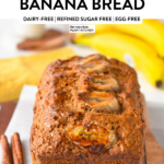 A loaf of banana bread with banana slices on top