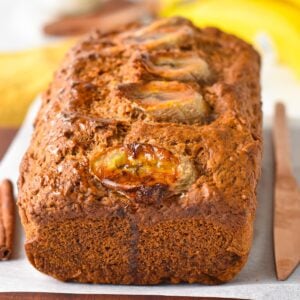 a banana bread made with spelt flour and banana slices on top