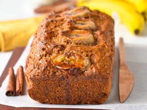 a banana bread made with spelt flour and banana slices on top