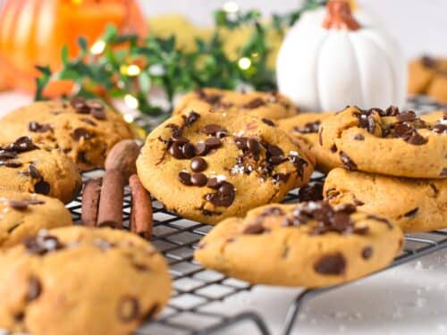 A cooling rack with Vegan Pumpkin Chocolate Chips Cookies
