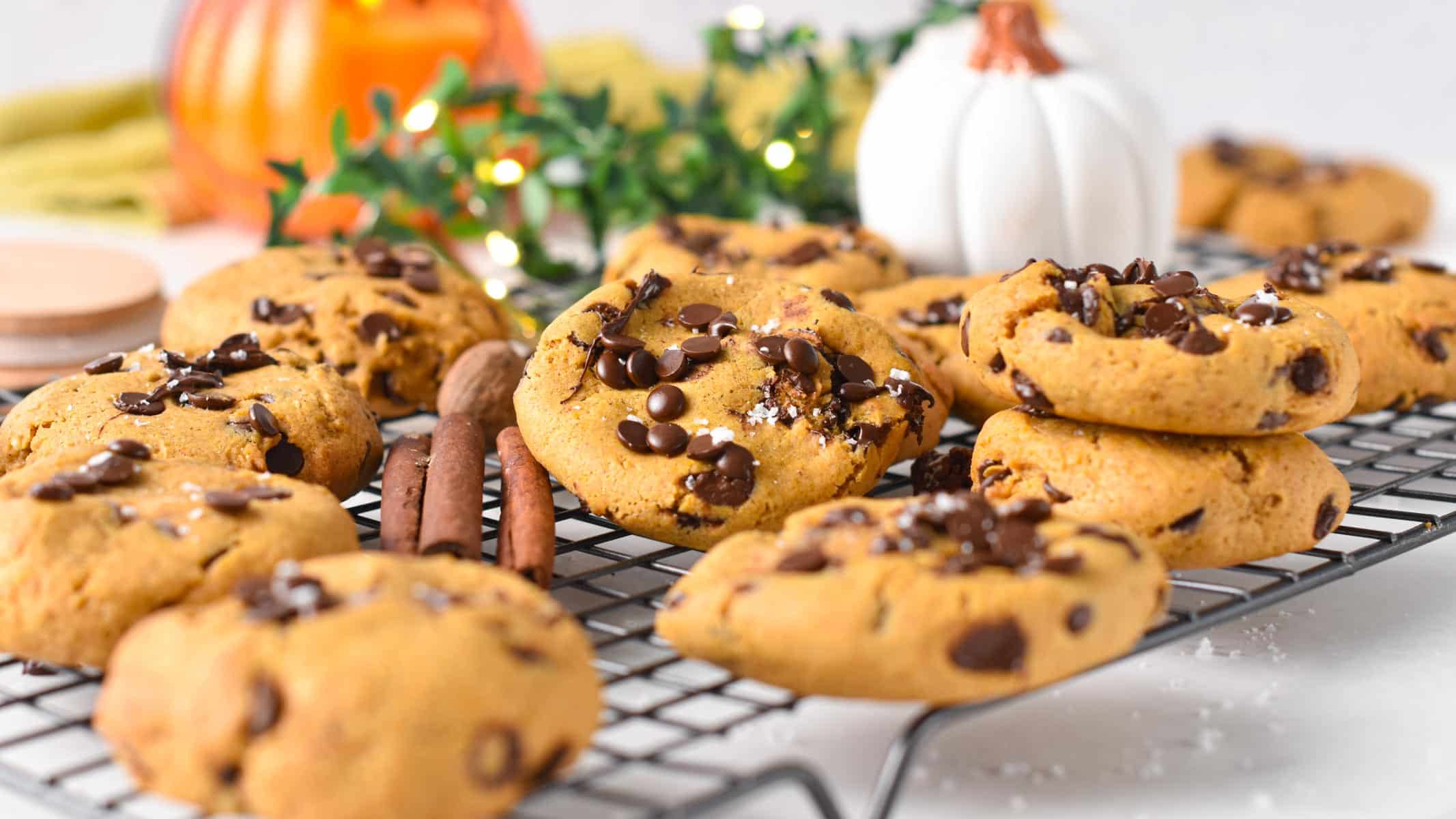 A cooling rack with Vegan Pumpkin Chocolate Chips Cookies