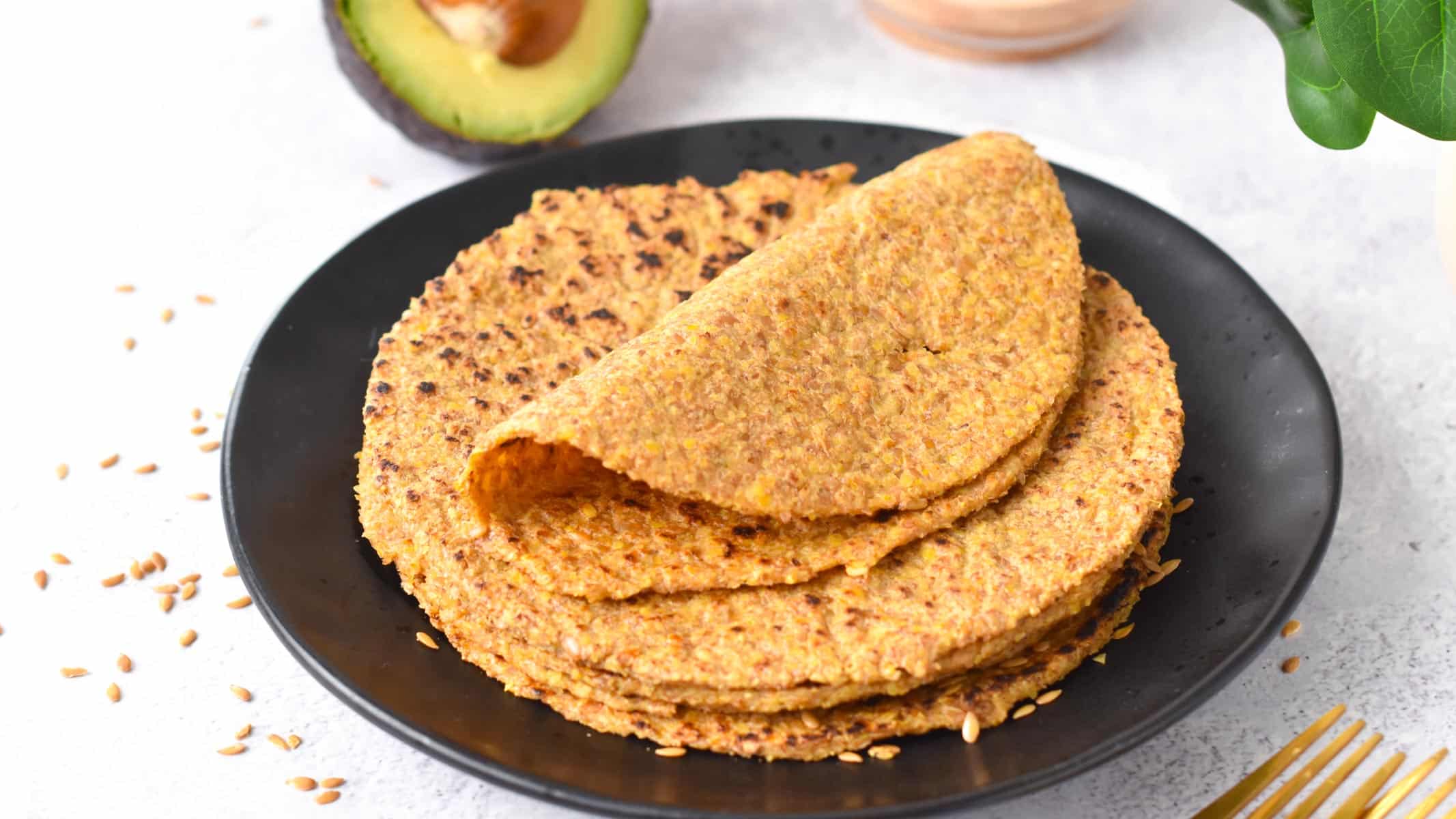 a plate filled with flaxseed wraps made with ground flaxseeds and water