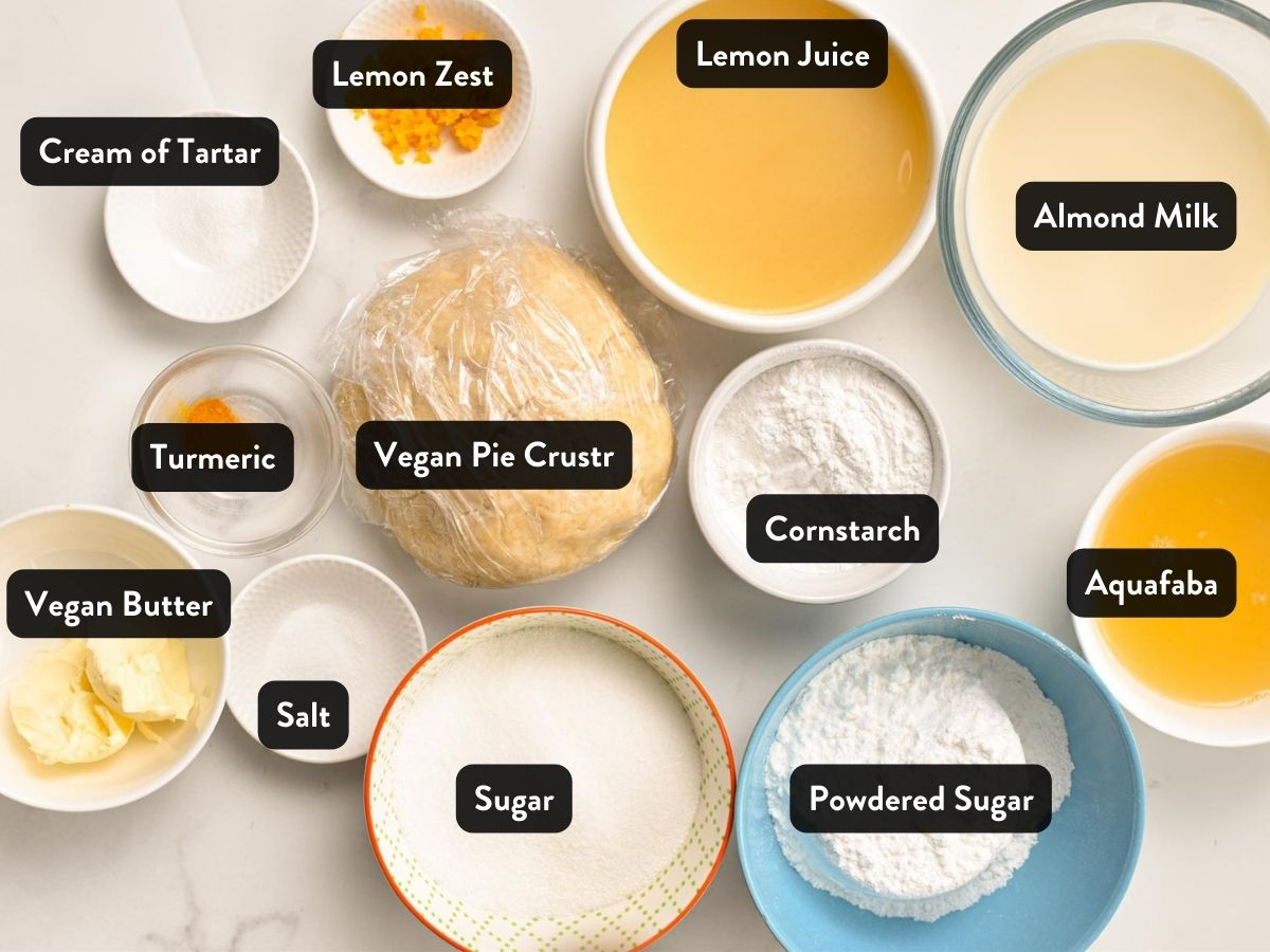 Ingredients for Vegan Lemon Meringue Pie in ramekins and bowls.