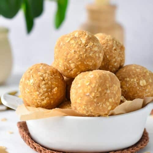 a bowl filled with lots of protein balls made with oats