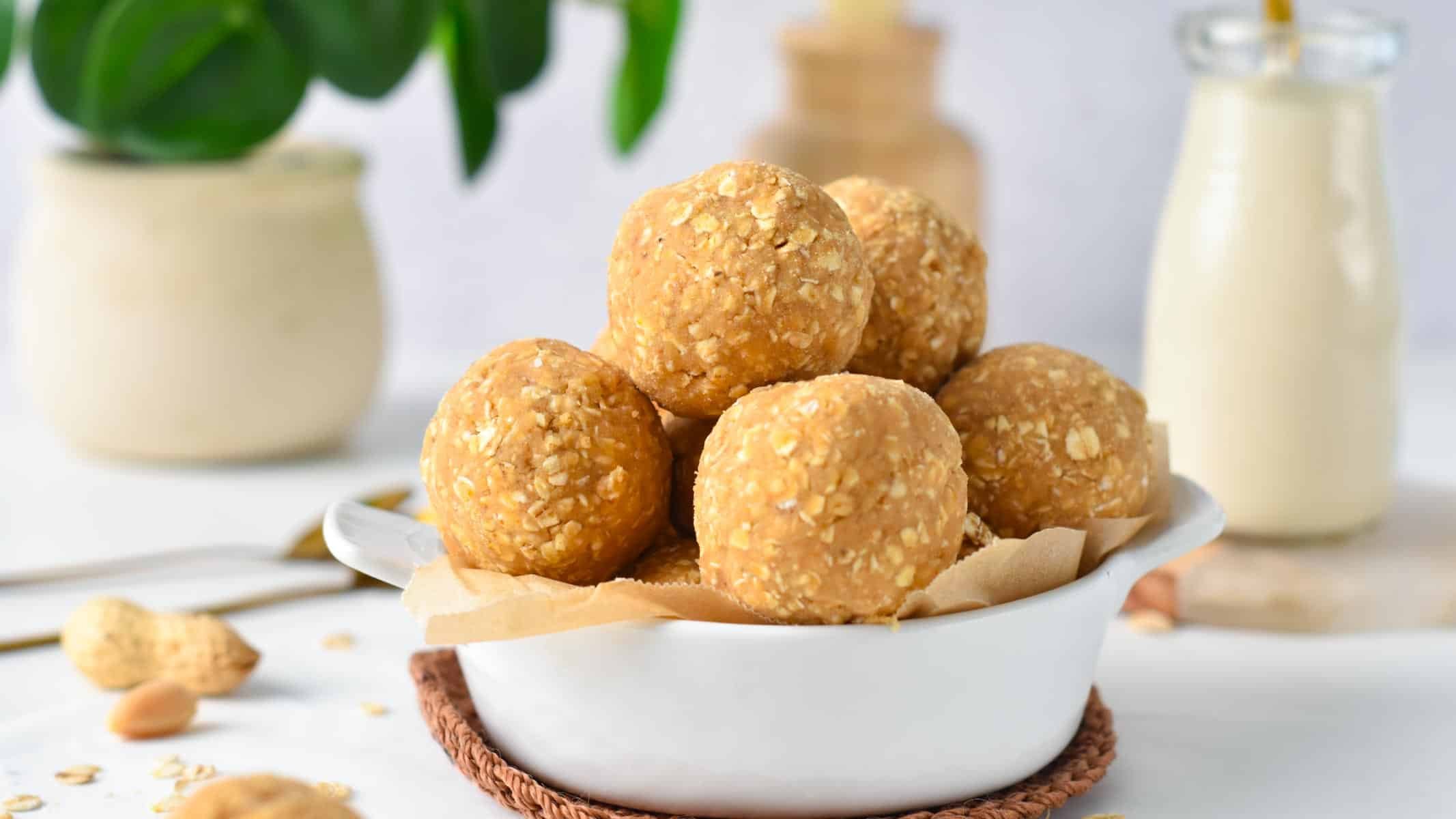 a bowl filled with lots of protein balls made with oats