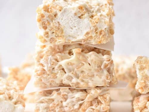 a stack of 3 vegan rice crispy treats filled with marshmallow