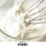 a stand mixer whisk with dairy-free whipped cream stiff peak