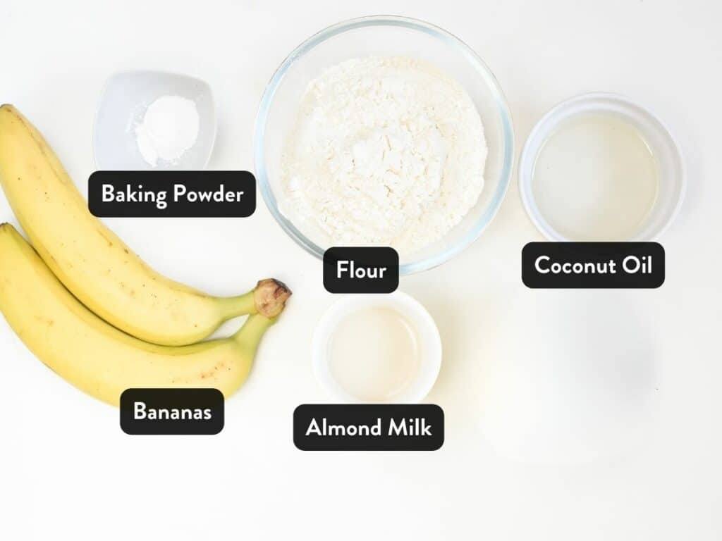 Ingredients for Vegan Sugar-Free Banana Muffins in various bowls and ramekins.
