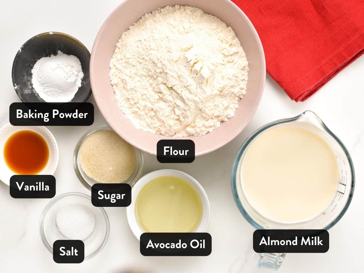 Ingredients for Vegan Waffles in bowls and ramekins.