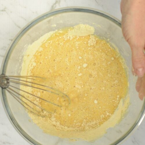 Stirring wet chickpea flour pancake ingredients