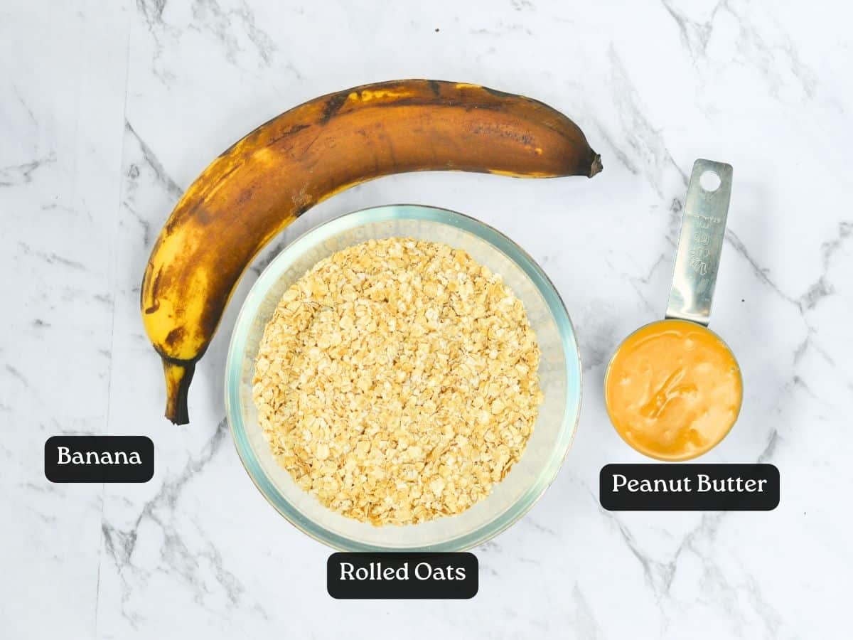 Ingredients for Peanut Butter Banana Oatmeal Cookies in bowls and measuring cup.