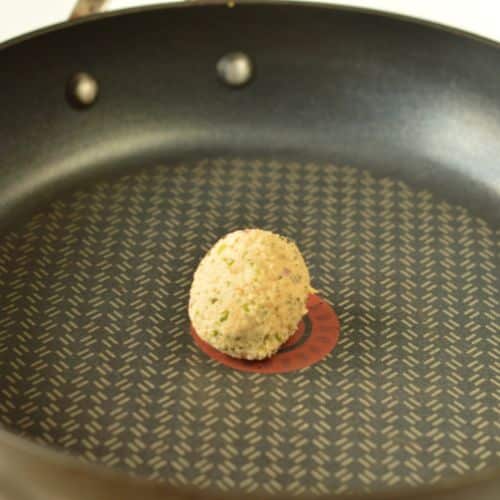 Cooking tempeh meatball on a frying pan