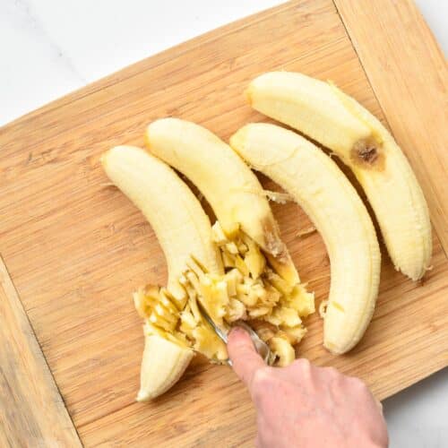 Mashing bananas for Oat Flour Banana Muffins