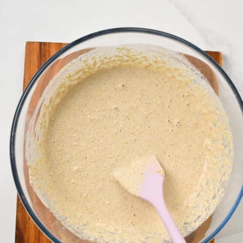 a mixing bowl with oat flour bread mixture