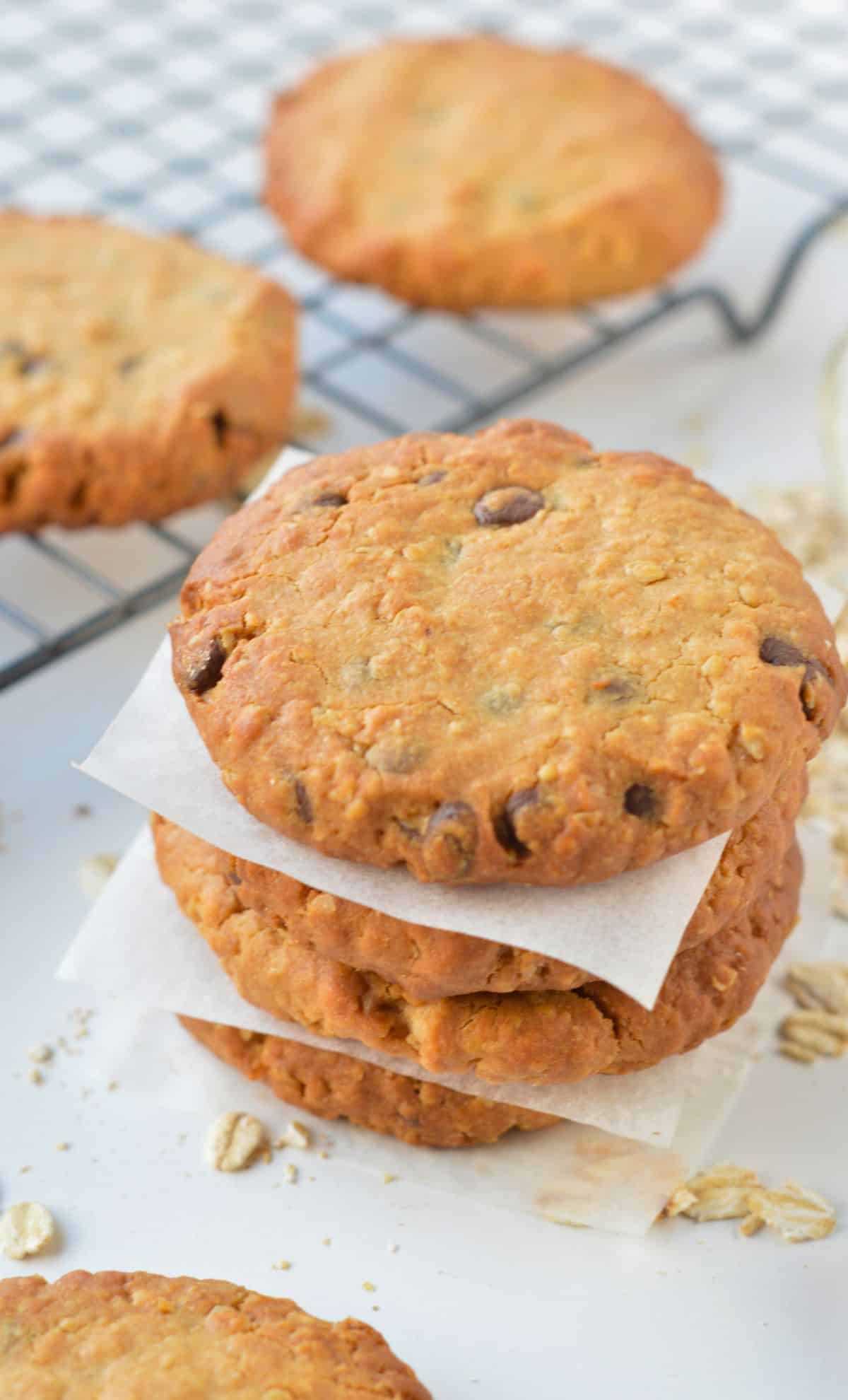 Vegan Peanut Butter Oatmeal Cookies stacked on a benchtop.