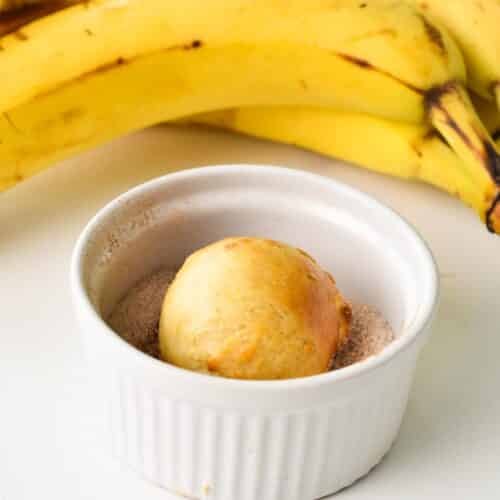 A banana donut hole in a ramekin