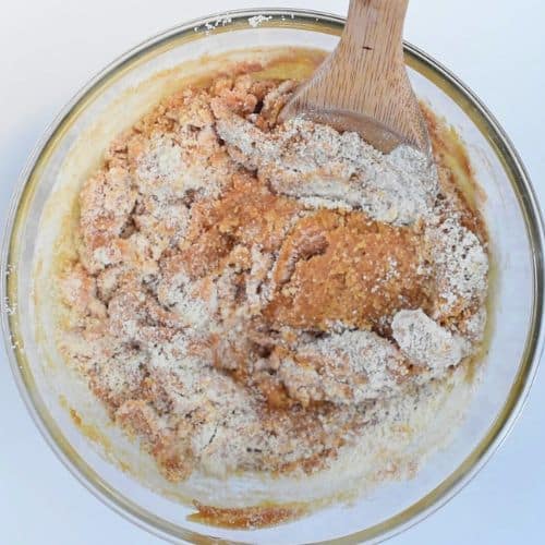 Peanut butter mixture with almond flour in a mixing bowl,