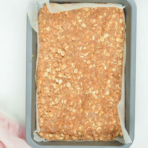 No-Bake Oatmeal Bar base in a baking pan.