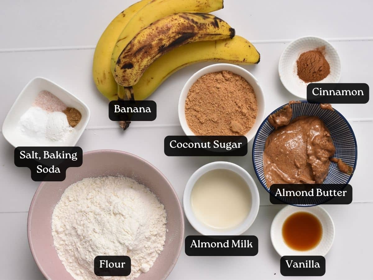 Ingredients For Banana Almond Butter Muffins in bowls and ramekins.