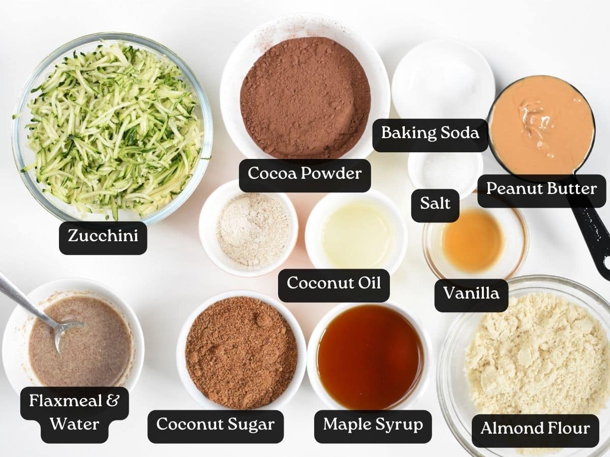 Ingredients For Gluten-Free Vegan Zucchini Brownies in bowls and ramekins.