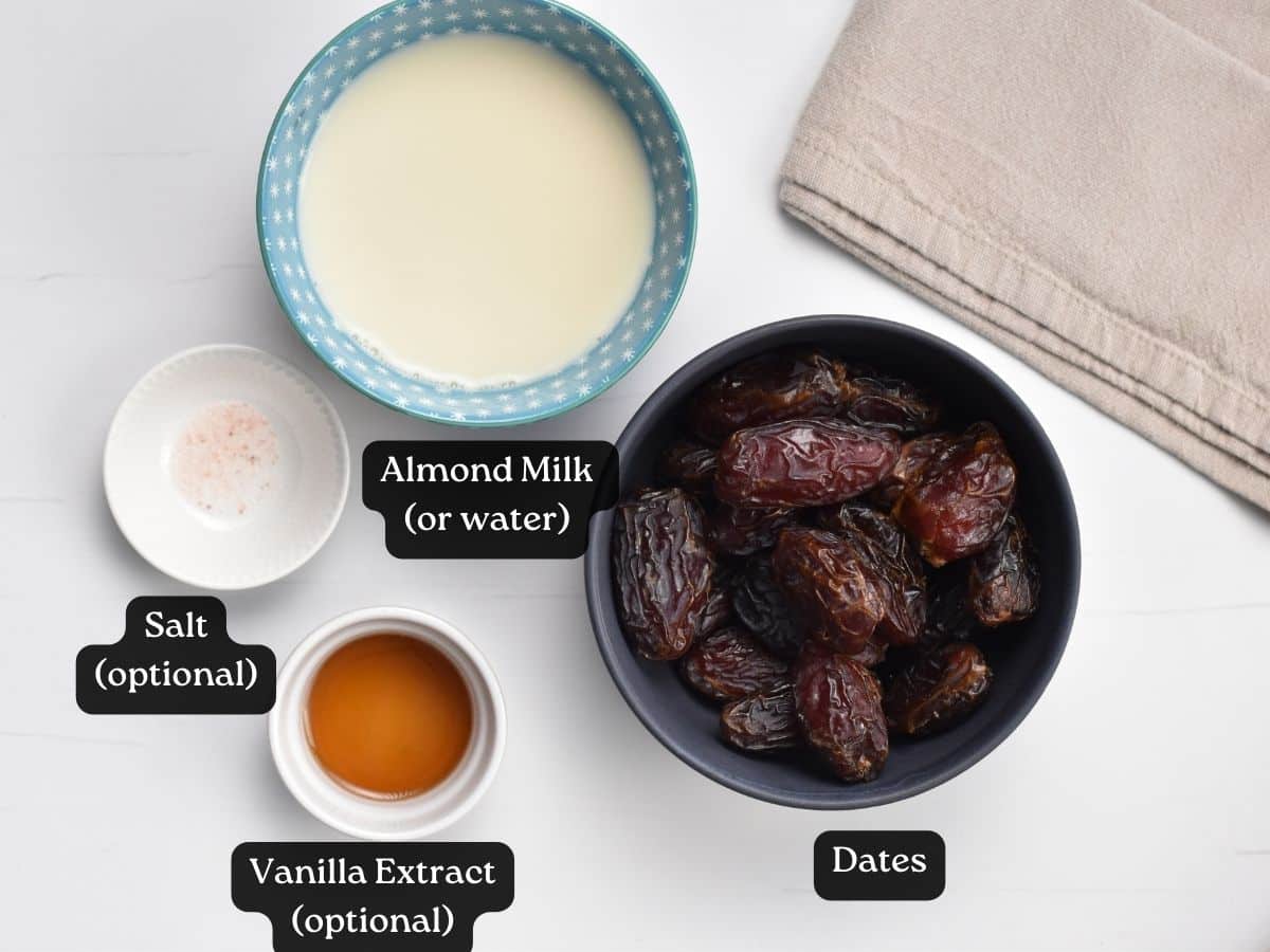 Ingredients for Date Caramel in bowls and ramekins.