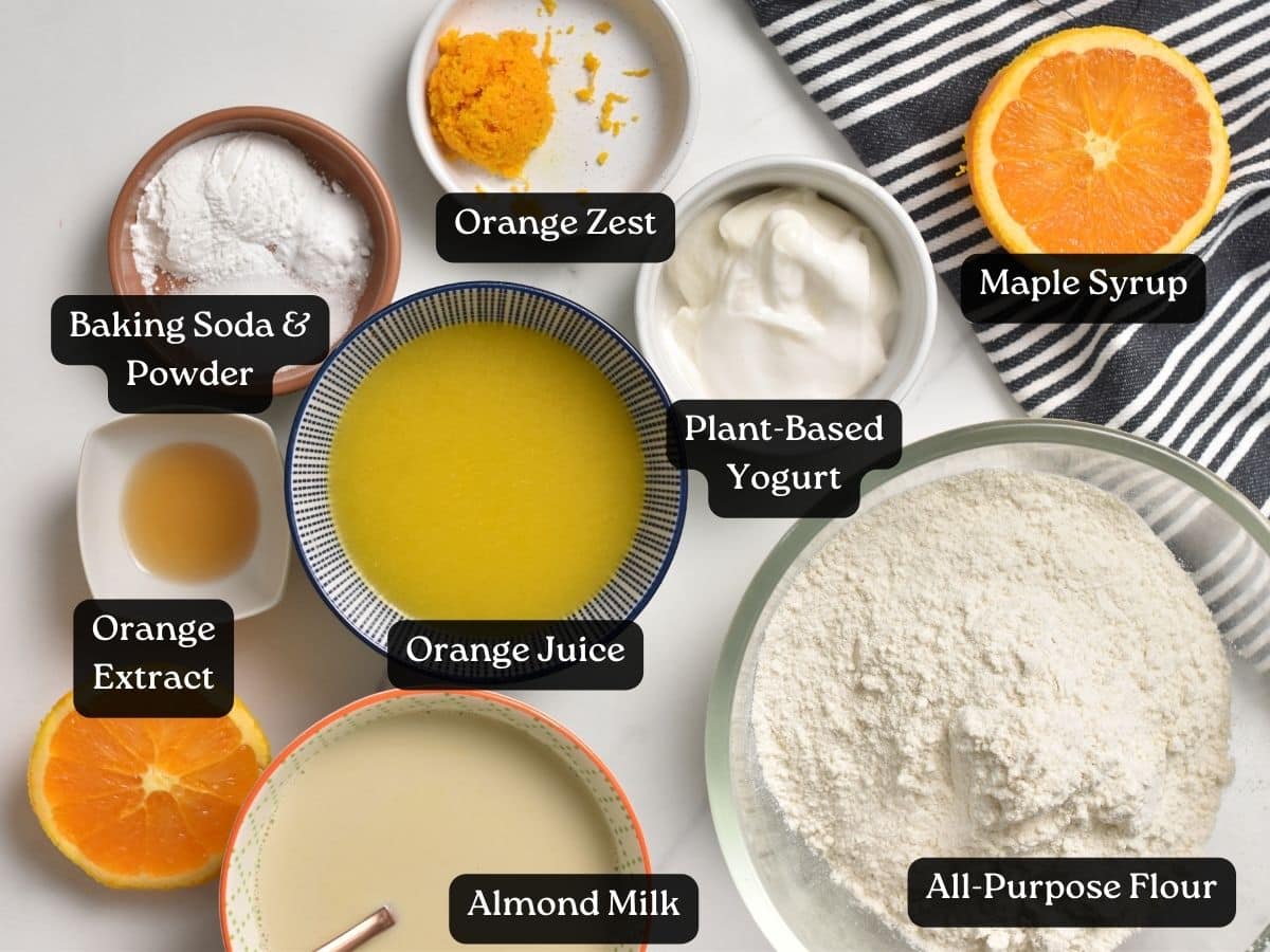 Ingredients for Orange Pound Cake in bowls and ramekins.