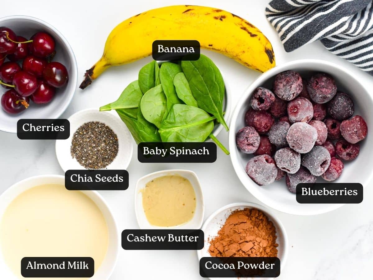 Ingredients for Chocolate Cherry Smoothie in bowls and ramekins.