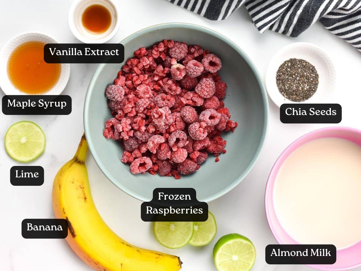 Ingredients for Raspberry Smoothie in bowls and ramekins.
