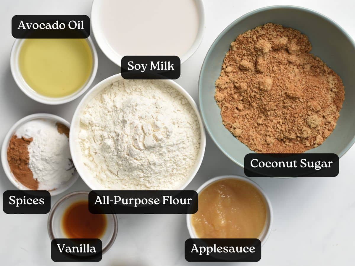 Ingredients for Vegan Carrot Cake in bowls and ramekins.