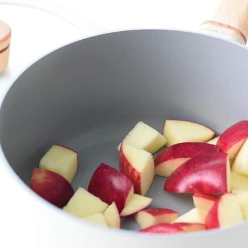 Sliced apples in a saucepan.